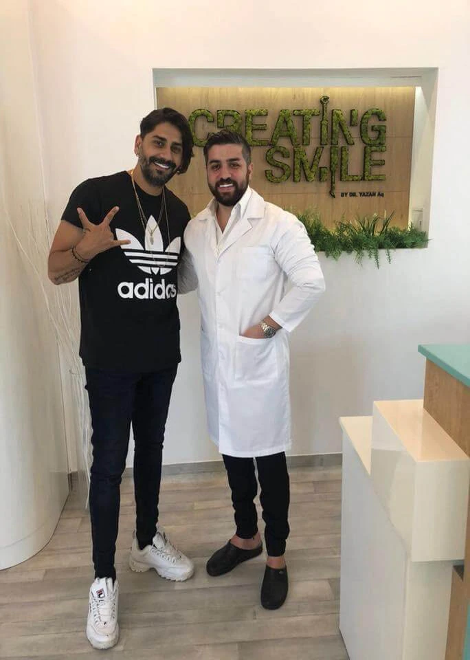 Dr. Yazan Aq. with patients and Romanian celebrities